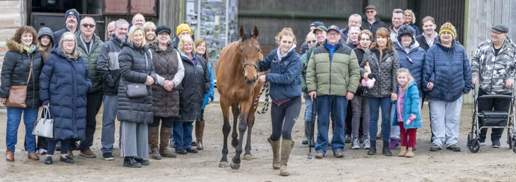 Group shot with Magic doing a walk through
