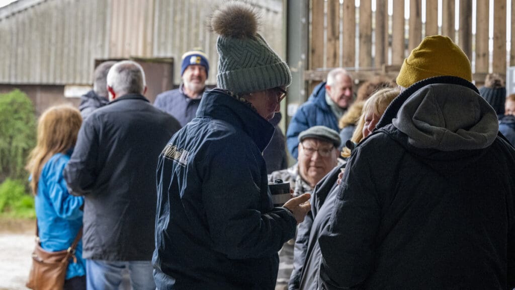 Ruth chats over coffee and cakes to the club members