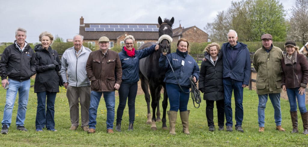 Jojo Rabbit poses like a star with his owners